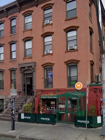 a view of a large building with many windows