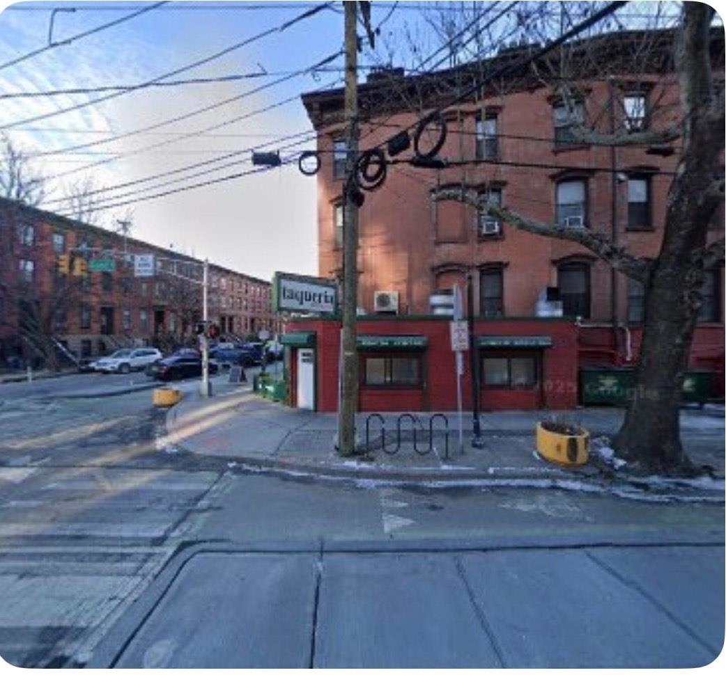 236 Grove Street Jersey City, NJ 07302 - Photo 2 of 7 a view of a building with couch