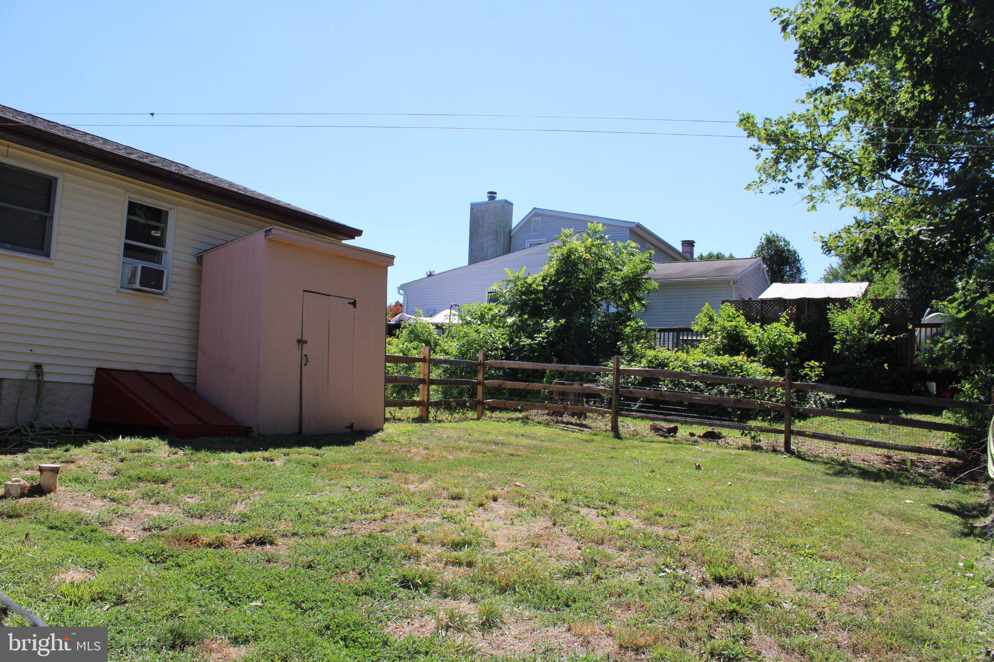 182 Rose Valley Road Pottstown, PA 19464 - Photo 6 of 52 Spacious backyard with lush greenery.