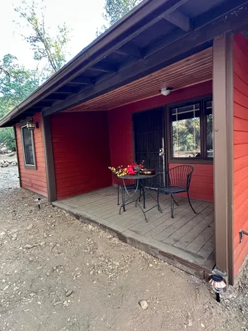 a view of a room with wooden walls