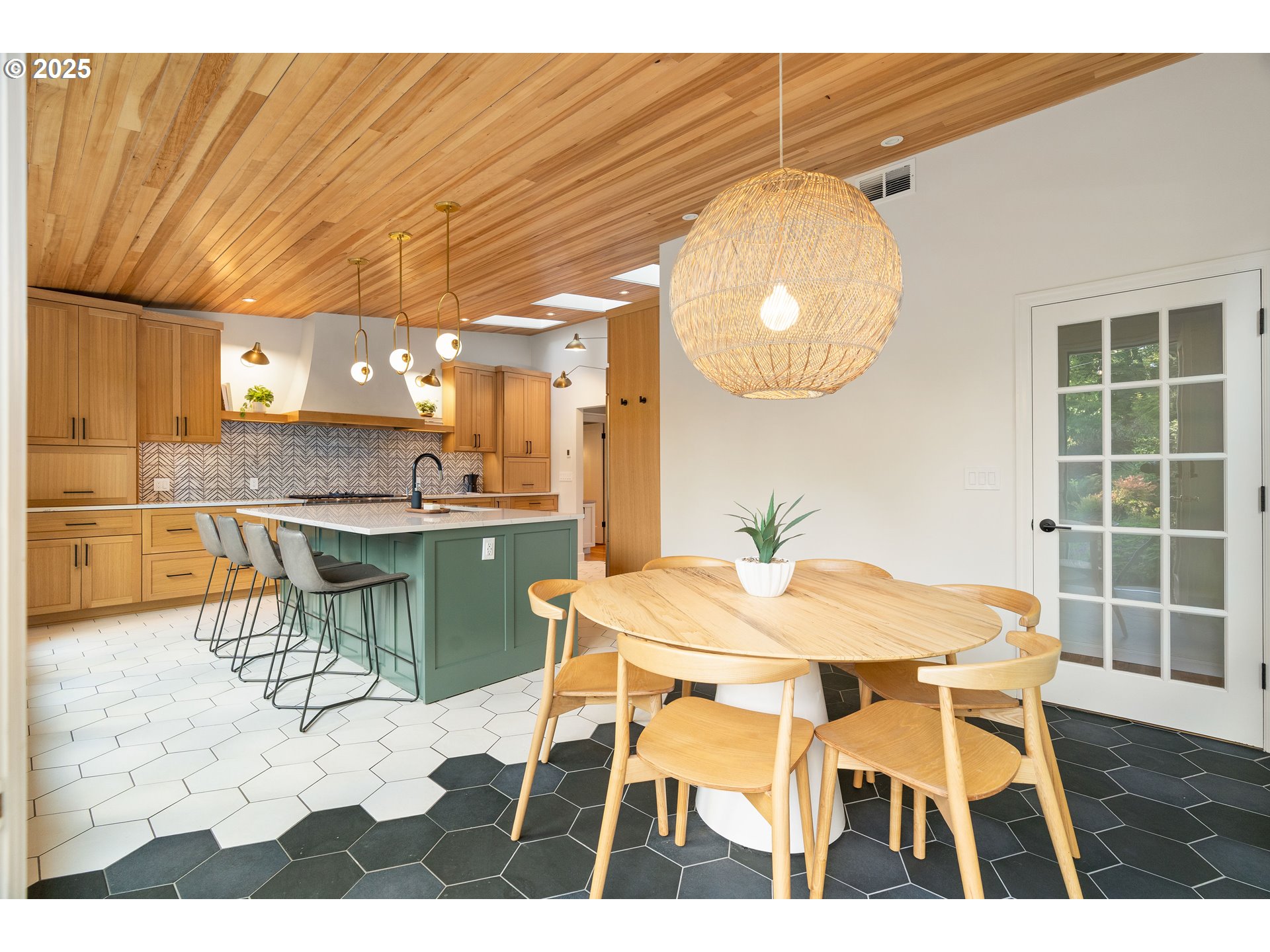 6328 Southwest Brugger Street Portland, OR 97219 - Photo 12 of 48 a view of a dining room with furniture and wooden floor