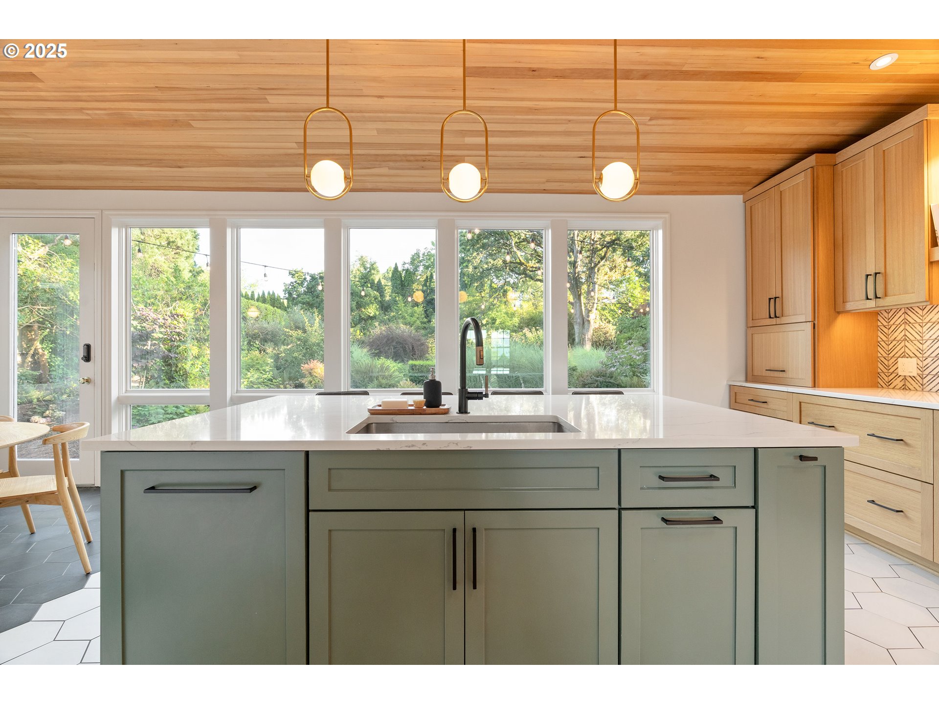 6328 Southwest Brugger Street Portland, OR 97219 - Photo 14 of 48 a kitchen with a sink and large window