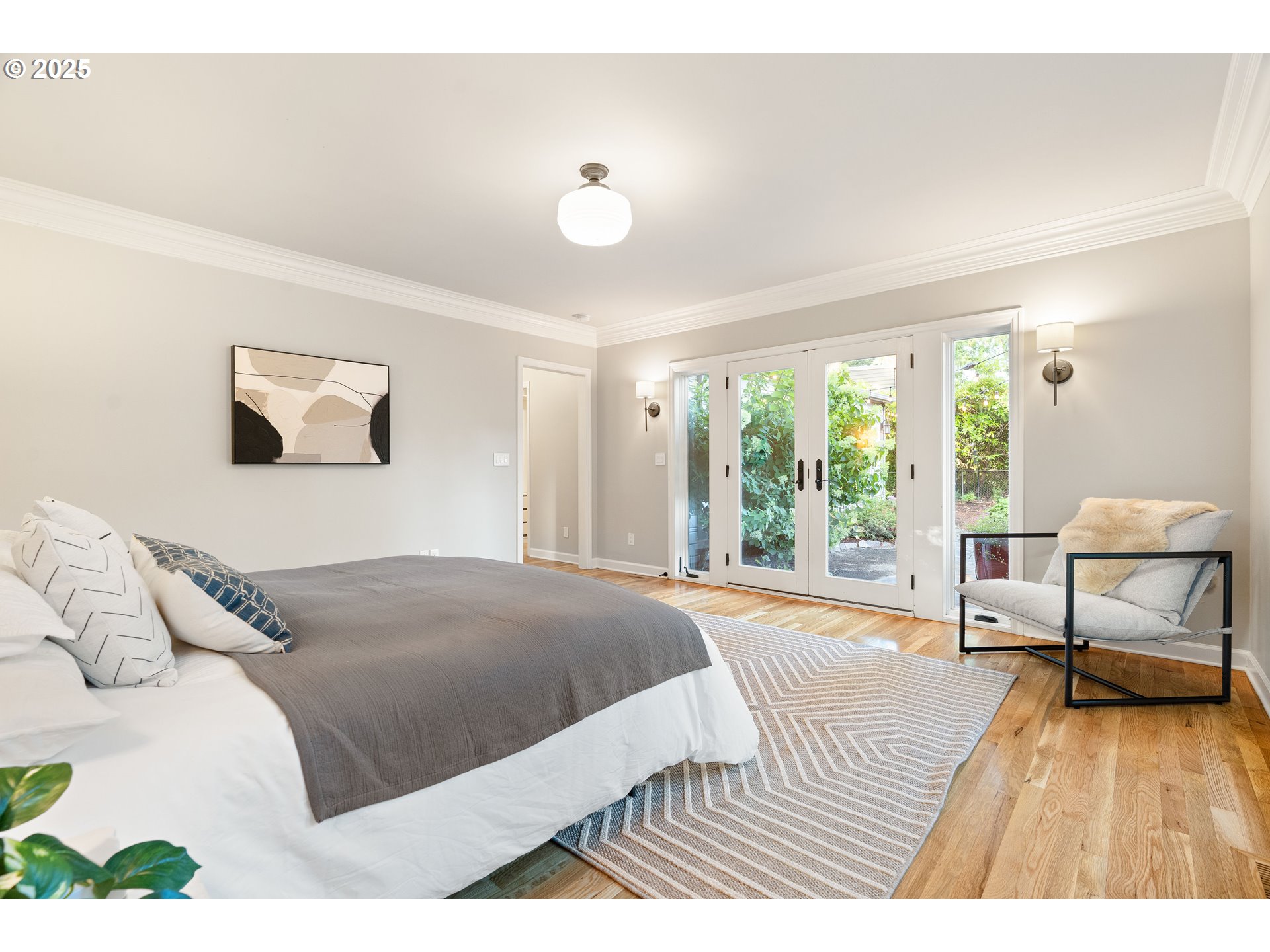 6328 Southwest Brugger Street Portland, OR 97219 - Photo 20 of 48 a bedroom with a bed and a large window