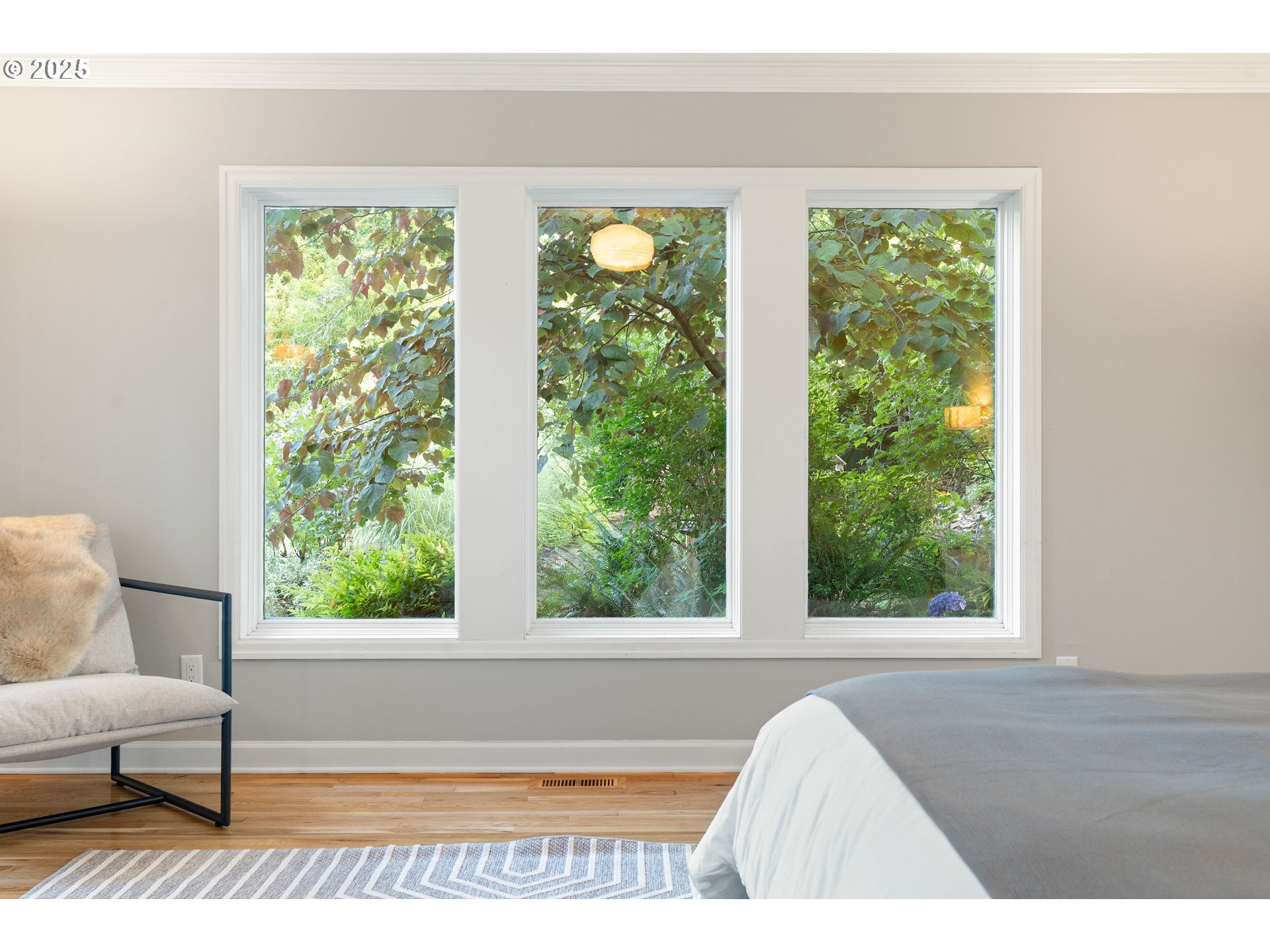 6328 Southwest Brugger Street Portland, OR 97219 - Photo 21 of 48 a view of a living room and a window
