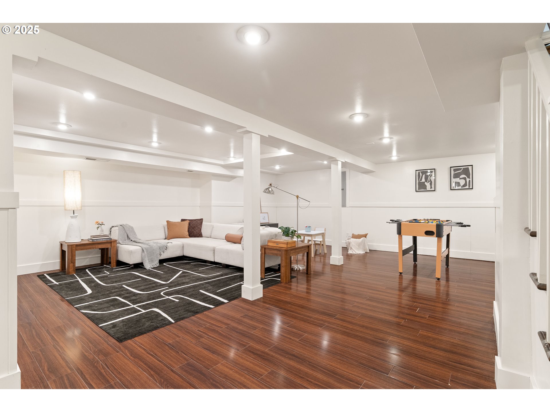 6328 Southwest Brugger Street Portland, OR 97219 - Photo 30 of 48 a living room with lots of furniture and kitchen view