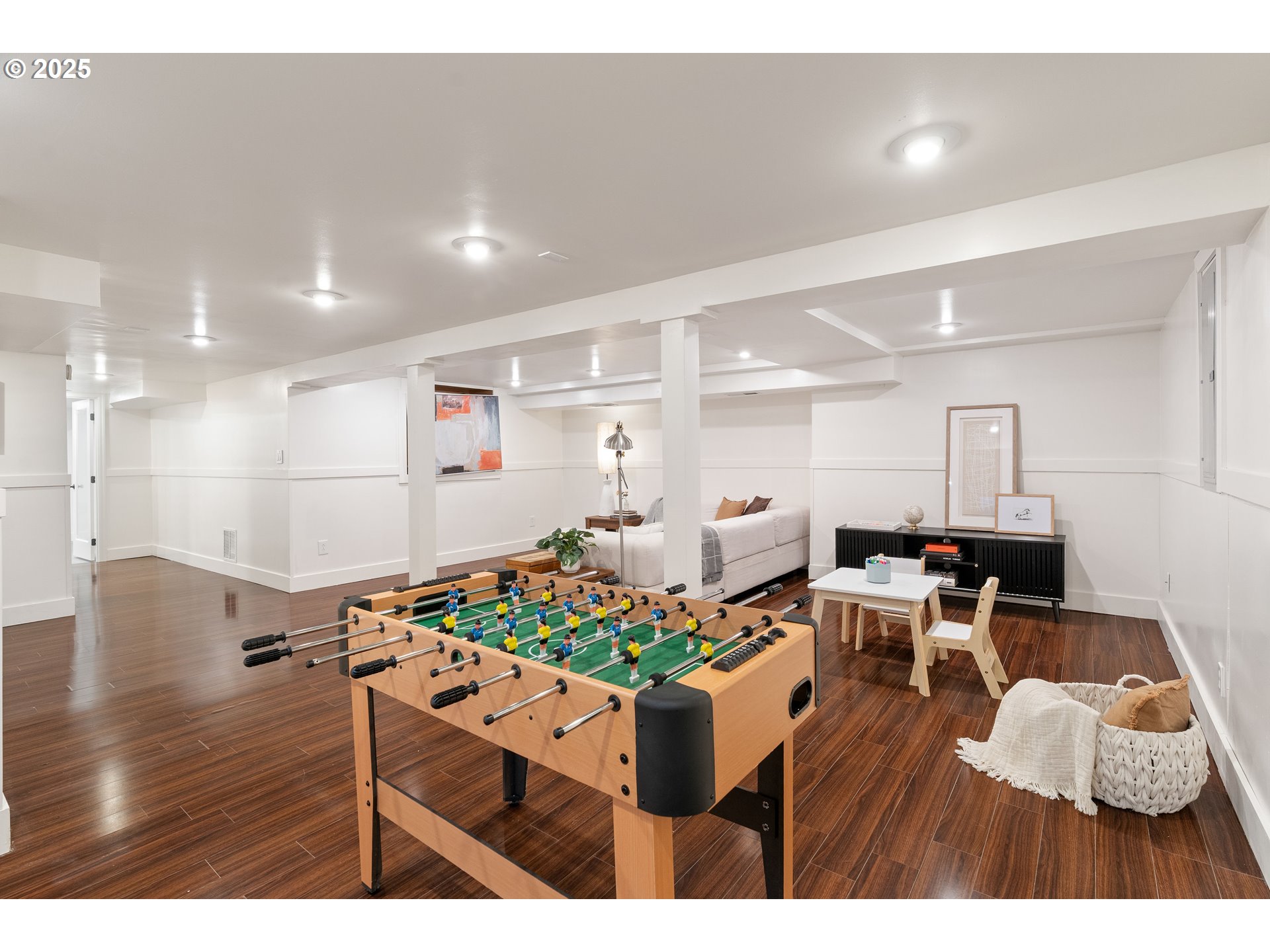 6328 Southwest Brugger Street Portland, OR 97219 - Photo 33 of 48 a living room with furniture and a table