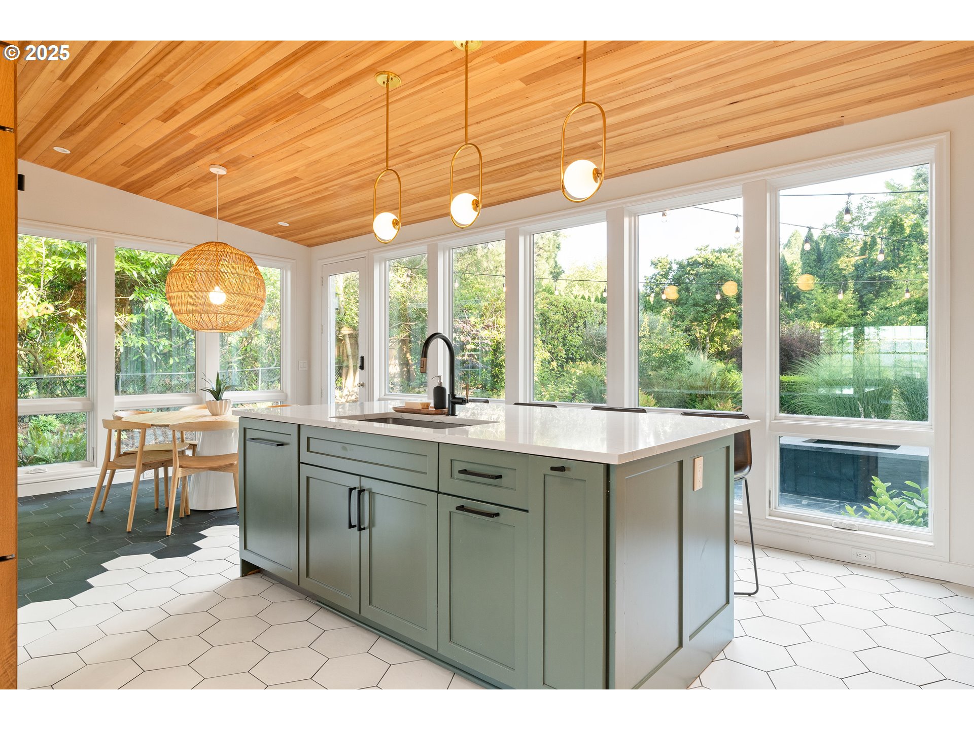 6328 Southwest Brugger Street Portland, OR 97219 - Photo 8 of 48 a kitchen with a sink and large window