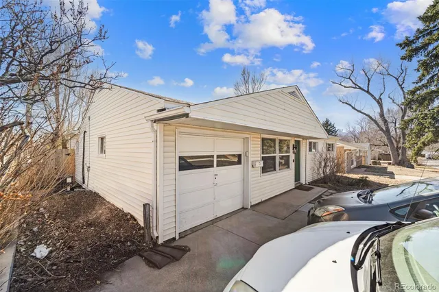a view of a patio with couches chairs and a barbeque
