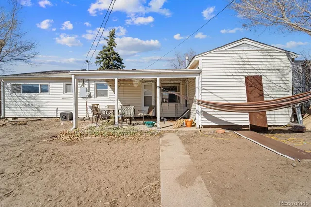a view of a house with a patio