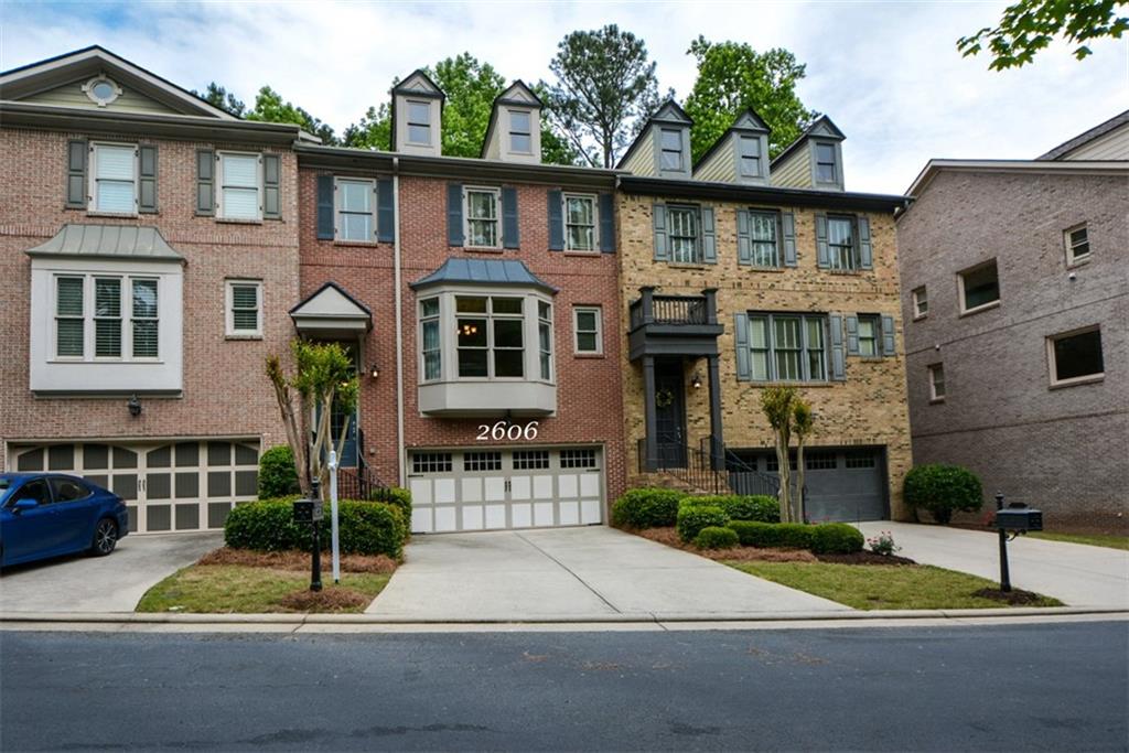 2606 Long Pointe Roswell, GA 30076 - Photo 1 of 1 Welcome to this elegant town home in a small, gated enclave in the heart of Roswell