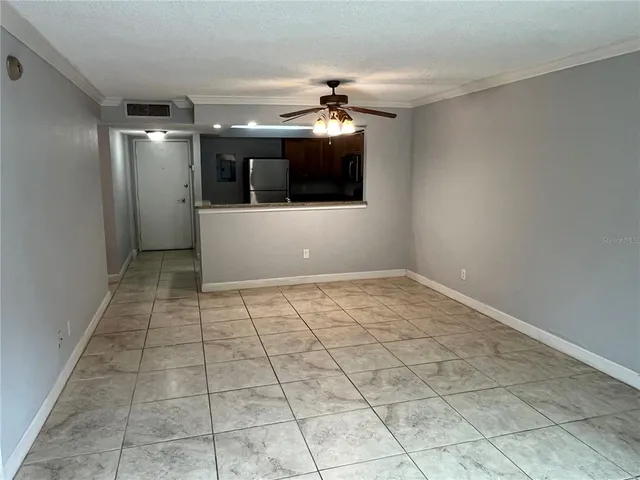 a view of an empty room and window