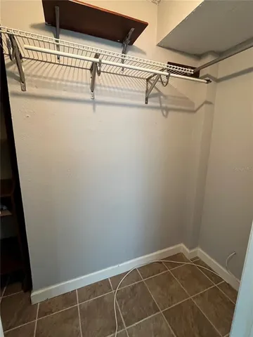 a view of a room with racks on the wall