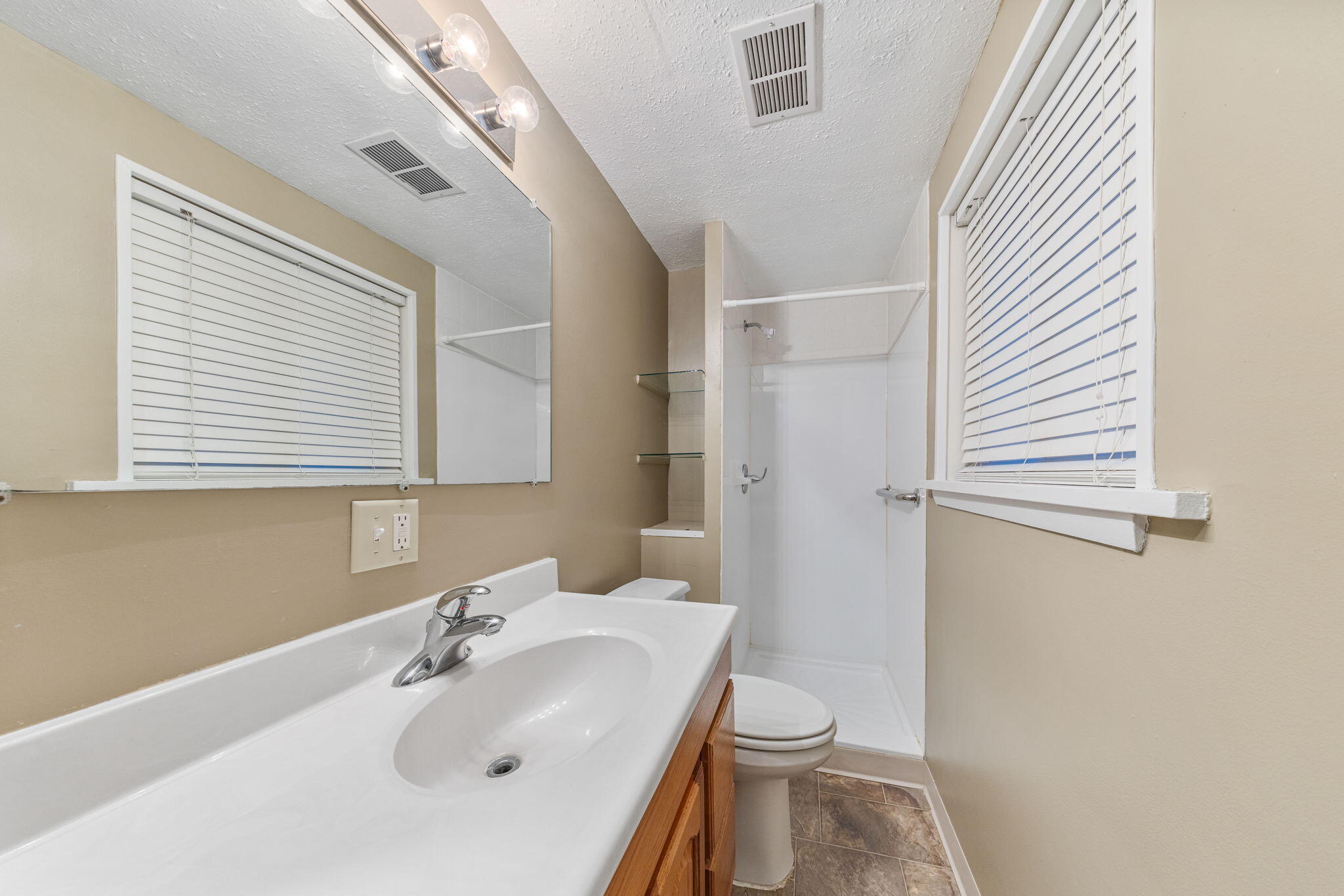 1807 West Porter Avenue Chesterton, IN 46304 - Photo 14 of 23 a bathroom with a sink and a toilet