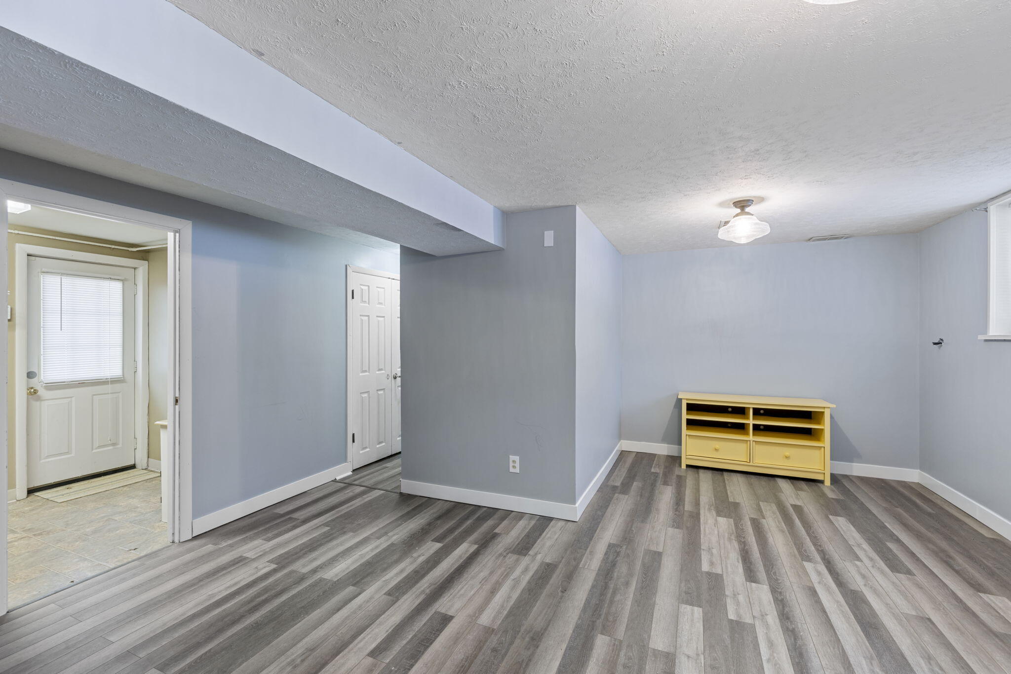 1807 West Porter Avenue Chesterton, IN 46304 - Photo 16 of 23 wooden floor and bench in a room