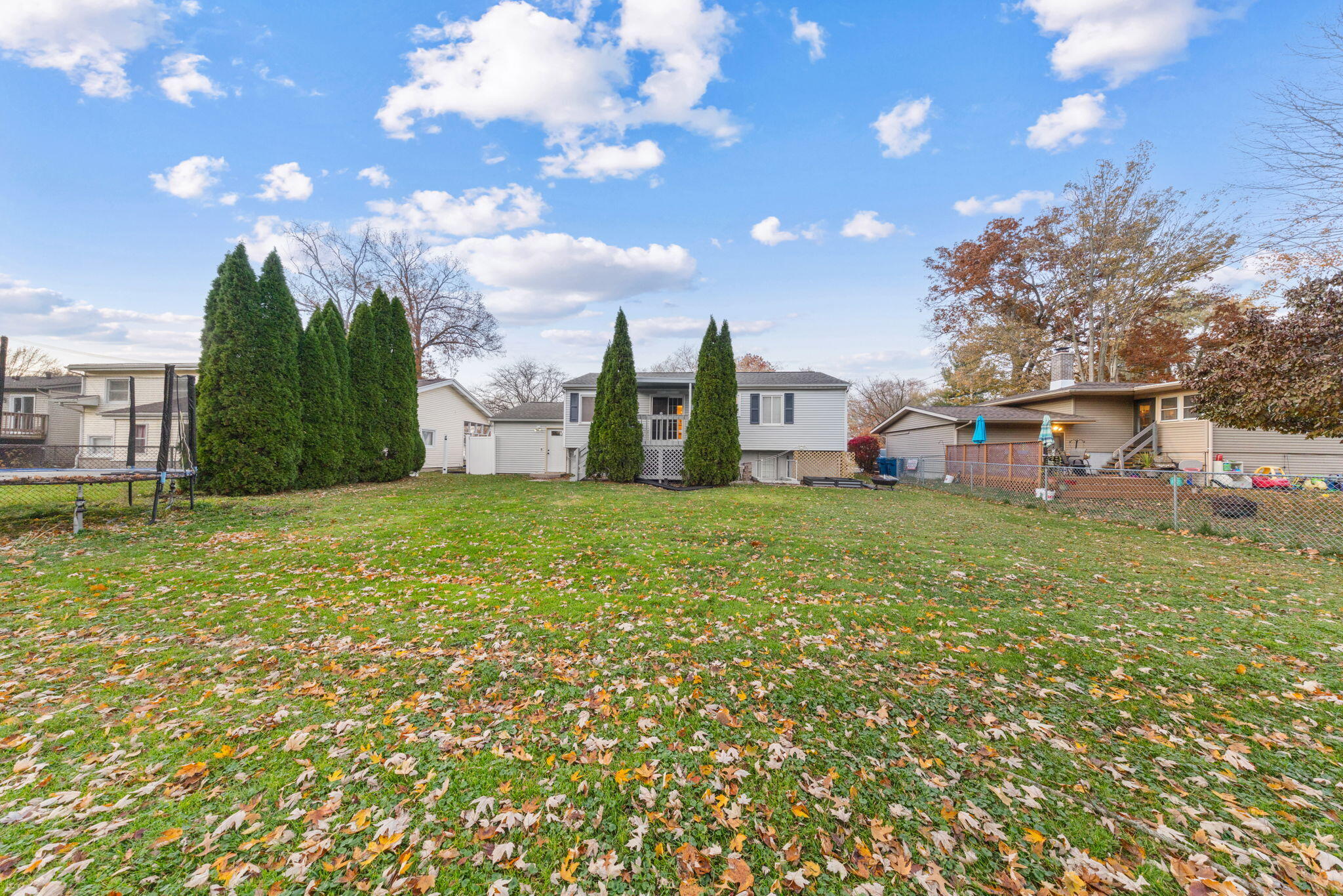 1807 West Porter Avenue Chesterton, IN 46304 - Photo 19 of 23 a view of a back yard of the house with green space