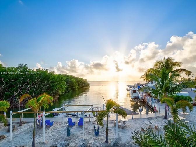 325 Calusa Street Key Largo, FL 33037 - Photo 33 of 34 a view of a lake from a roof deck