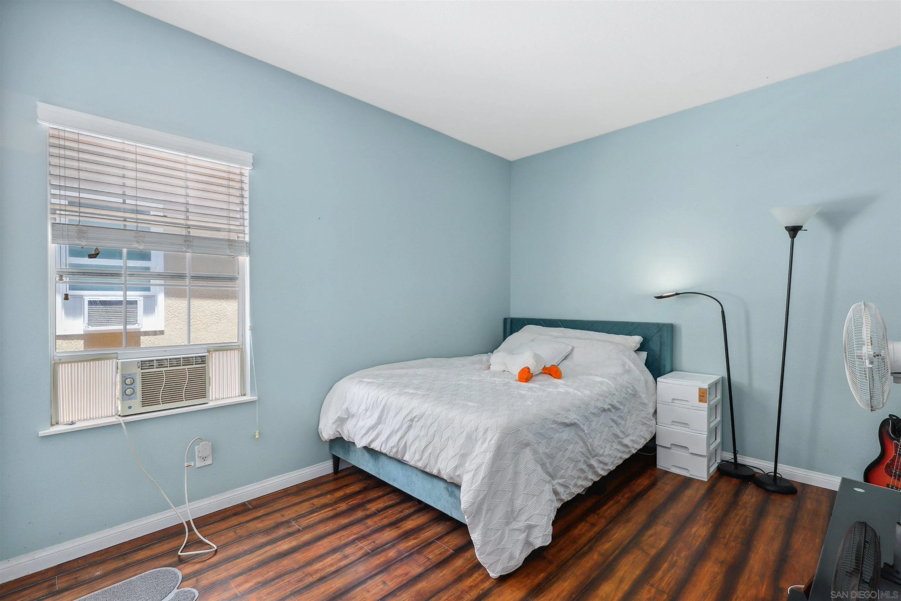 535 Venetia Way Oceanside, CA 92057 - Photo 13 of 27 a bedroom with a bed and window