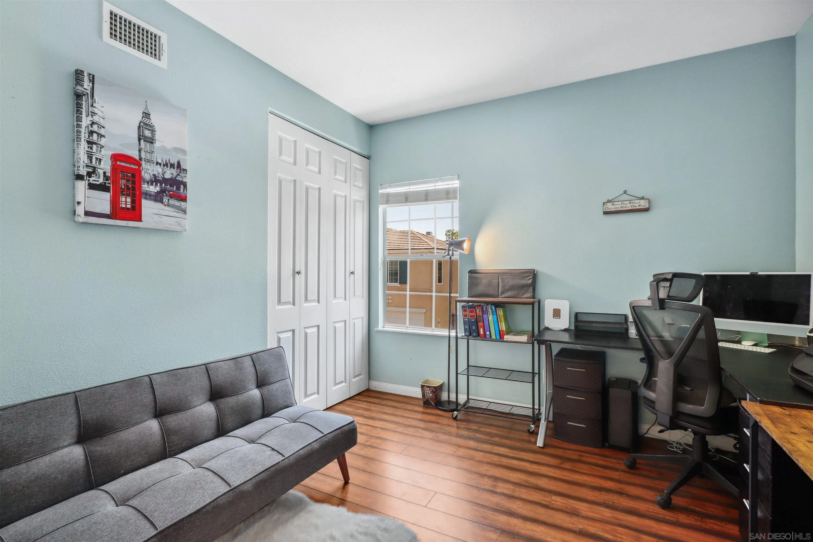 535 Venetia Way Oceanside, CA 92057 - Photo 16 of 27 a living room with furniture and wooden floor