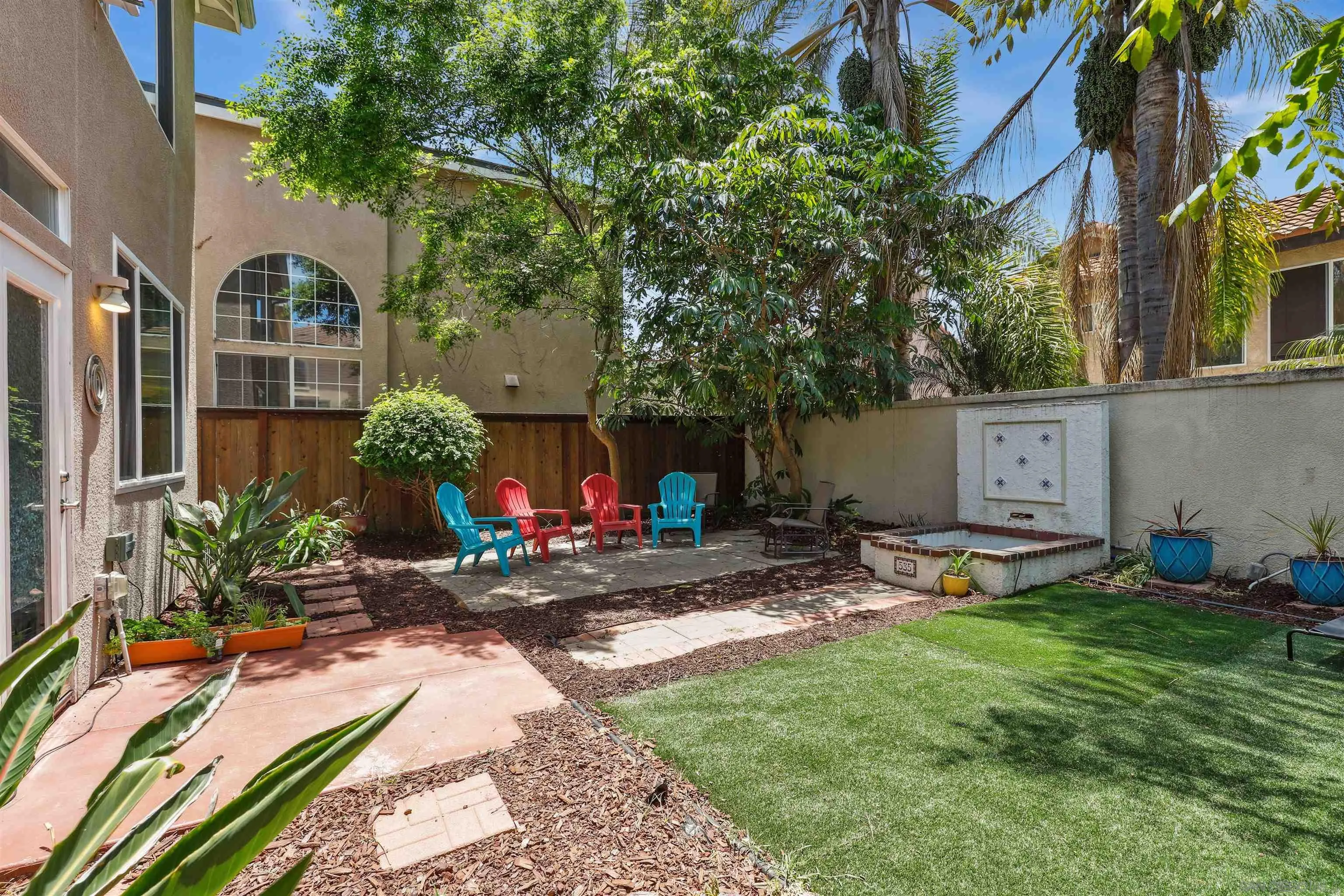 535 Venetia Way Oceanside, CA 92057 - Photo 18 of 27 a view of a backyard with sitting area and furniture