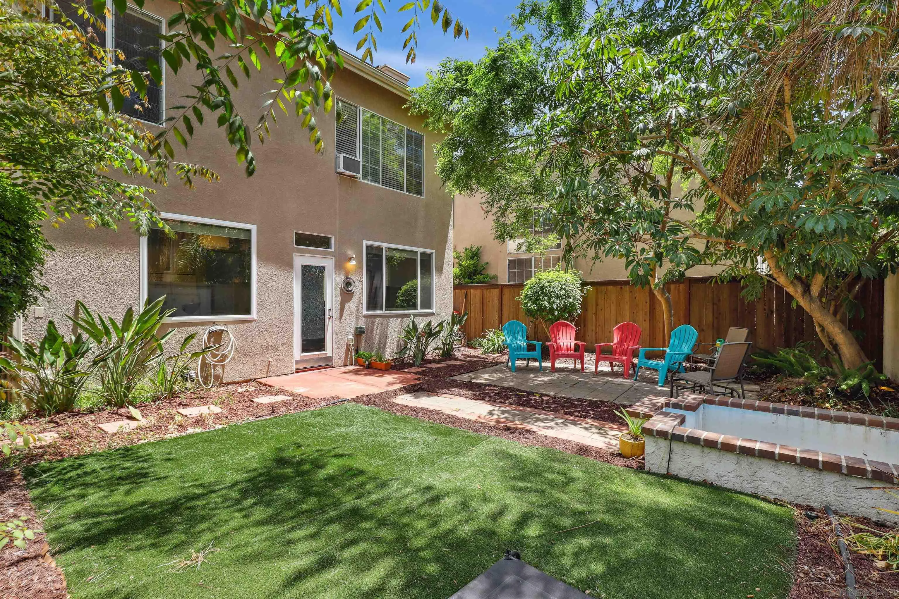 535 Venetia Way Oceanside, CA 92057 - Photo 21 of 27 a view of a backyard with sitting area and furniture