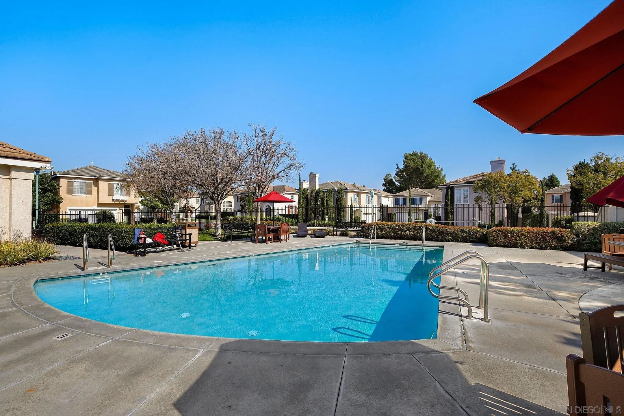 535 Venetia Way Oceanside, CA 92057 - Photo 23 of 27 a view of a swimming pool with outdoor seating