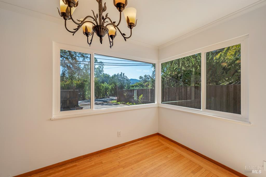 815 Dry Creek Road Healdsburg, CA 95448 - Photo 6 of 37 a view of empty room with wooden floor and fan