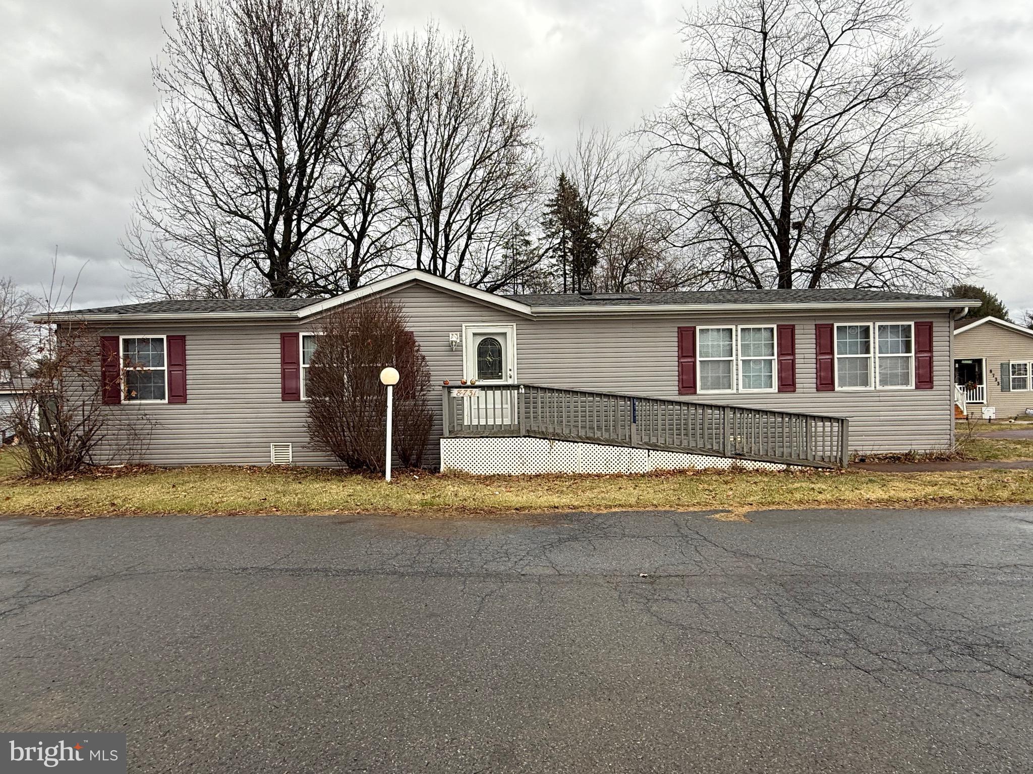 8731 Turkey Ridge Road Breinigsville, PA 18031 - Photo 2 of 68 a view of a house with a yard and large tree
