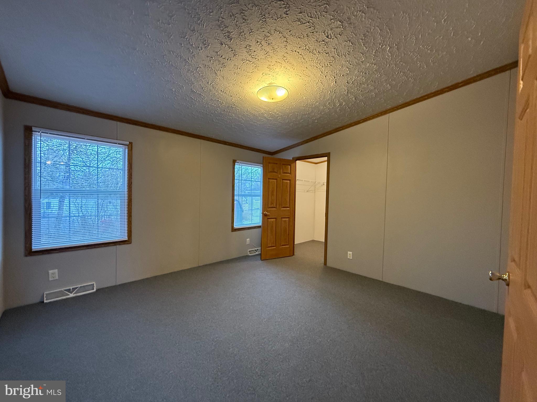 8731 Turkey Ridge Road Breinigsville, PA 18031 - Photo 29 of 68 an empty room with windows