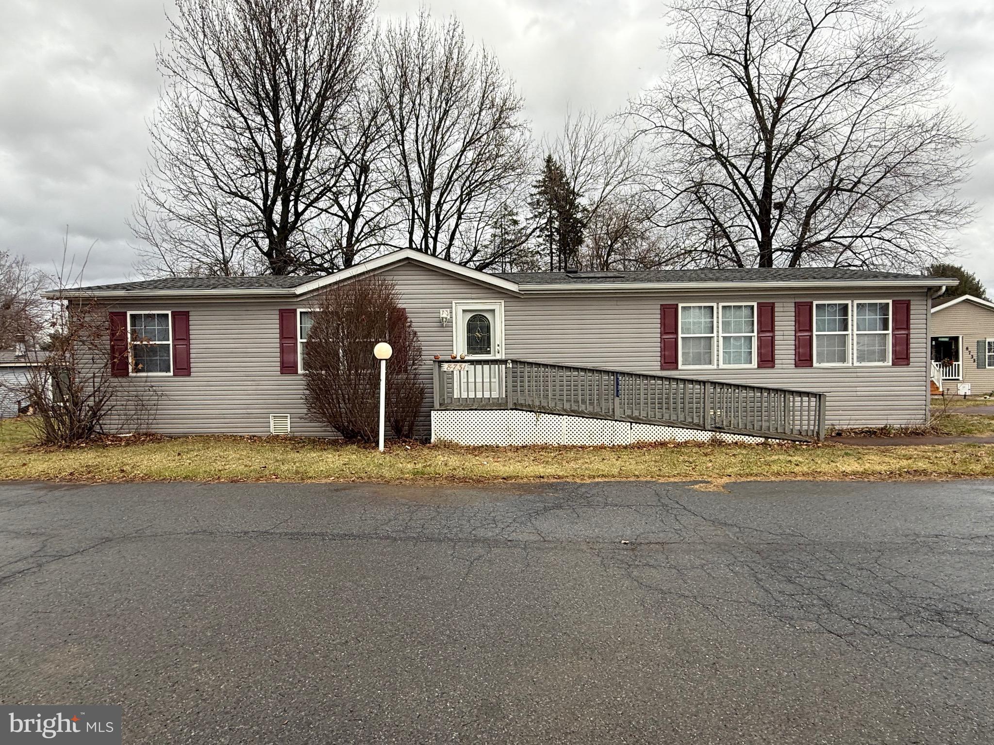 8731 Turkey Ridge Road Breinigsville, PA 18031 - Photo 5 of 68 a house view with a outdoor space