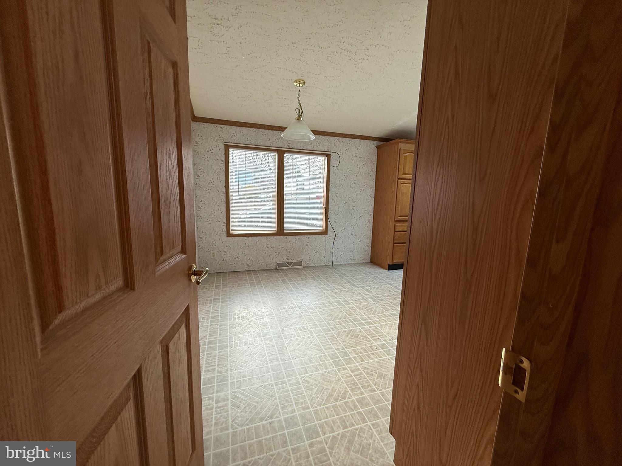 8731 Turkey Ridge Road Breinigsville, PA 18031 - Photo 56 of 68 a view of an empty room with a window