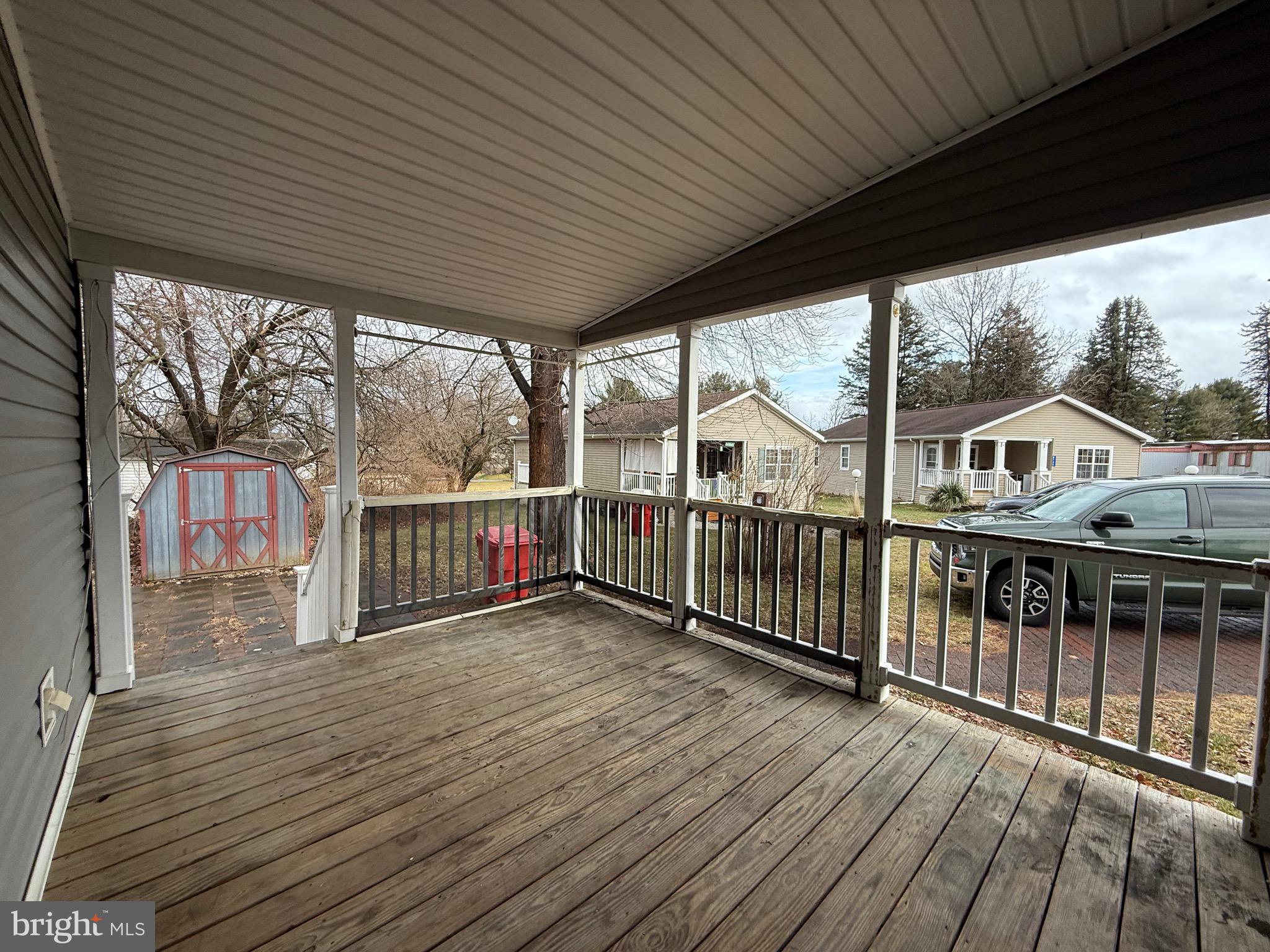 8731 Turkey Ridge Road Breinigsville, PA 18031 - Photo 59 of 68 a view of a balcony with wooden floor