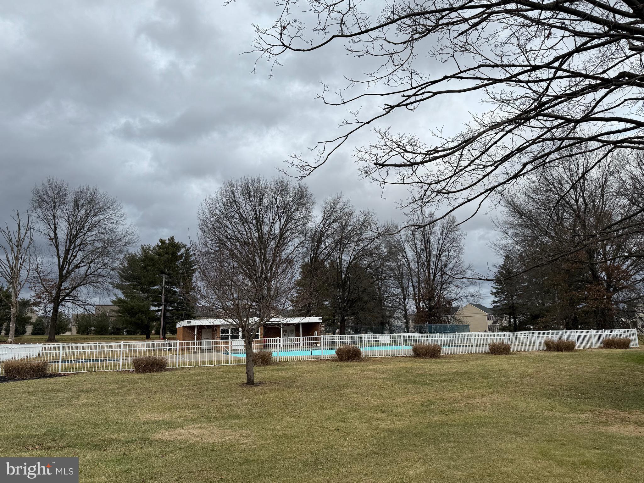 8731 Turkey Ridge Road Breinigsville, PA 18031 - Photo 62 of 68 a view of yard with lake and trees