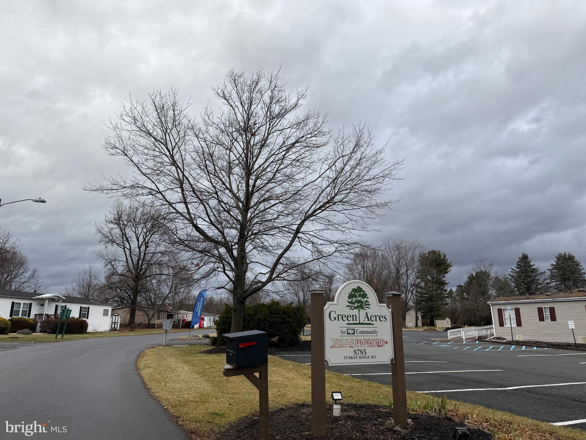 8731 Turkey Ridge Road Breinigsville, PA 18031 - Photo 67 of 68 a sign board with buildings in the background