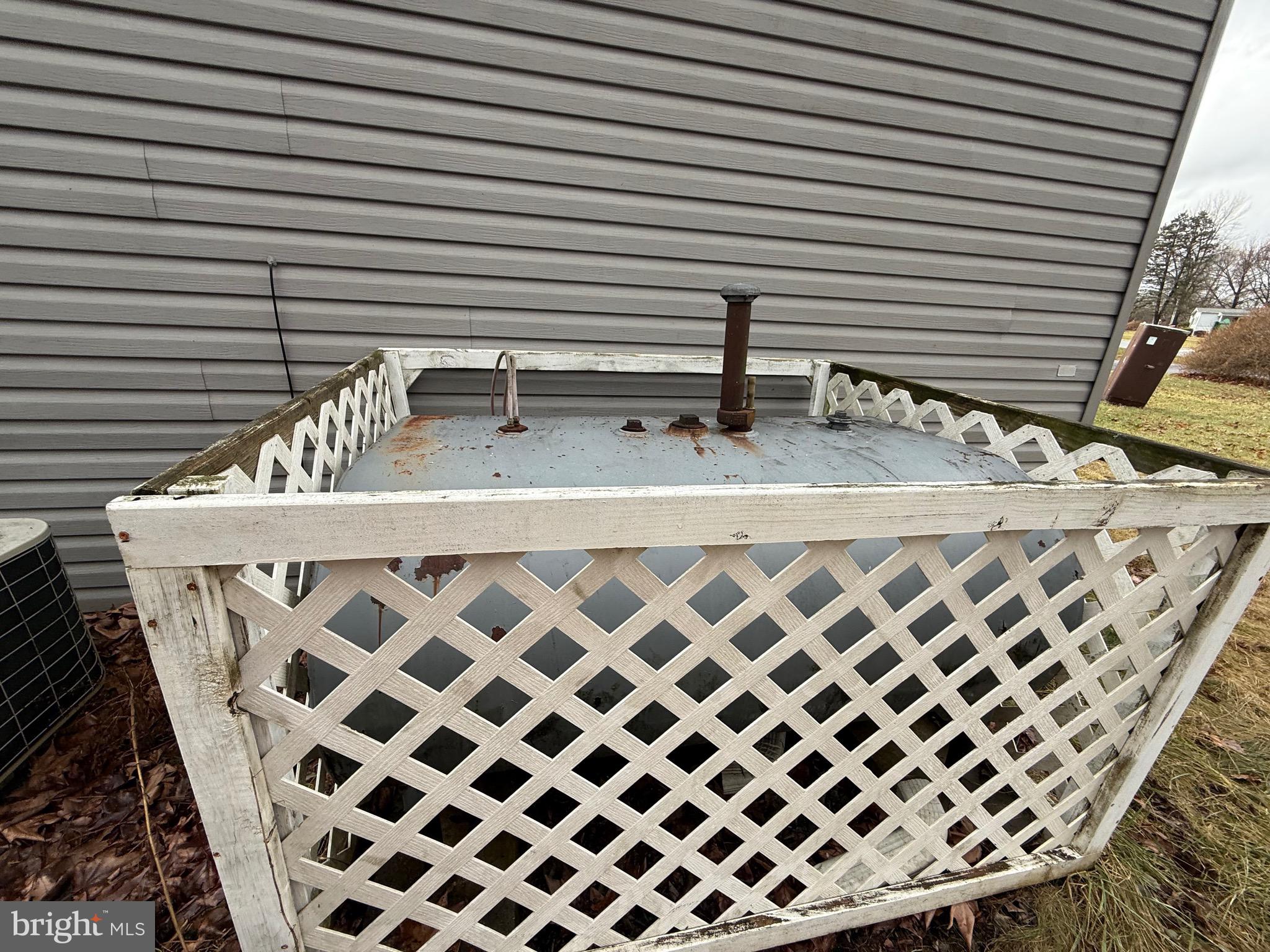 8731 Turkey Ridge Road Breinigsville, PA 18031 - Photo 8 of 68 a close view of a sink a mirror and a wooden floor