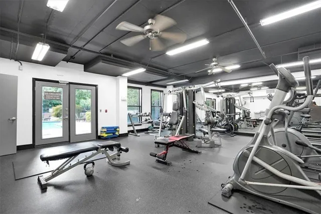 a view of a balcony with mountain view and wooden floor