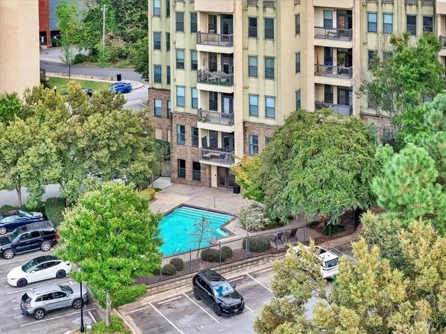 front view of a building with a garden