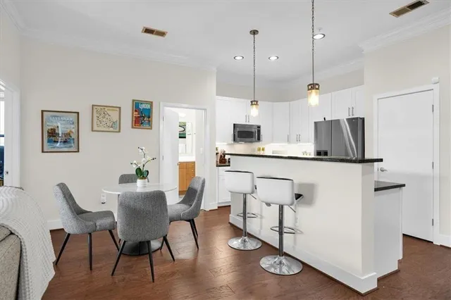 a view of a swimming pool with a lounge chairs