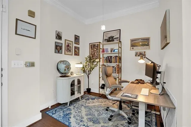 a bedroom with bed and a window