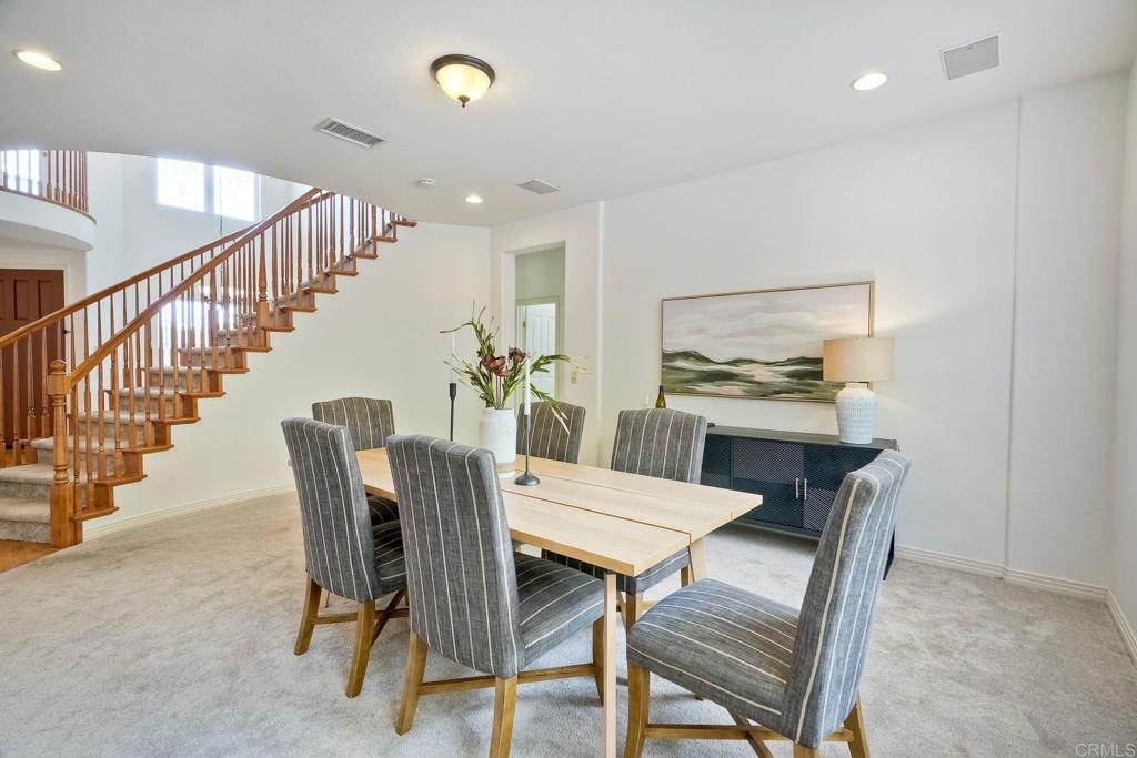 1026 Turnstone Road Carlsbad, CA 92011 - Photo 12 of 38 a view of a dining room with furniture