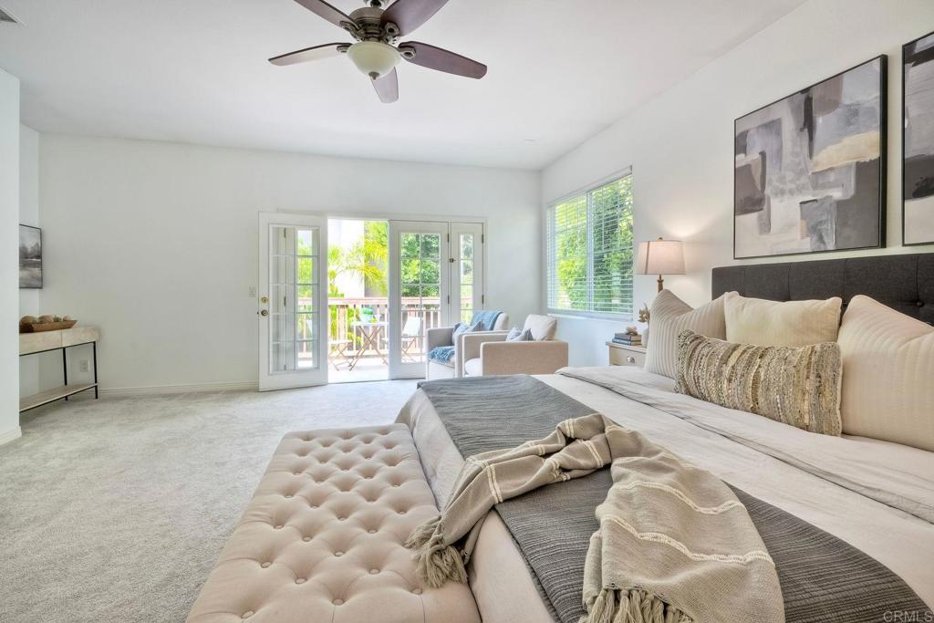 1026 Turnstone Road Carlsbad, CA 92011 - Photo 20 of 38 a bedroom with a bed and a couch