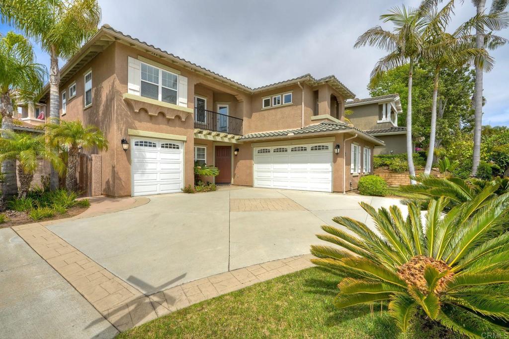 1026 Turnstone Road Carlsbad, CA 92011 - Photo 35 of 38 a front view of a house with a garden