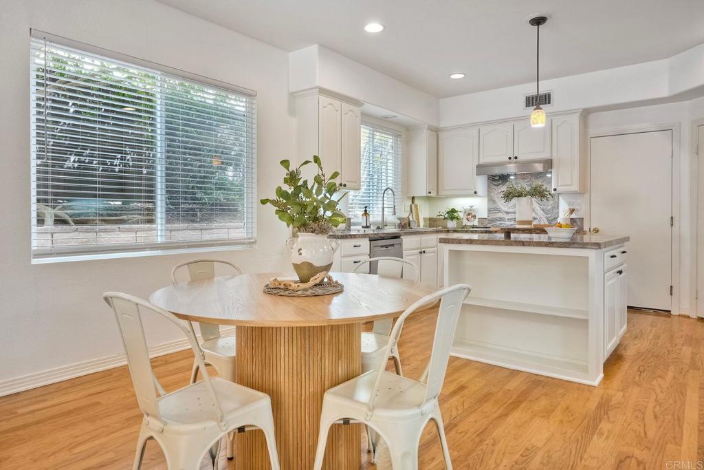 1026 Turnstone Road Carlsbad, CA 92011 - Photo 6 of 38 a dining room with furniture and window