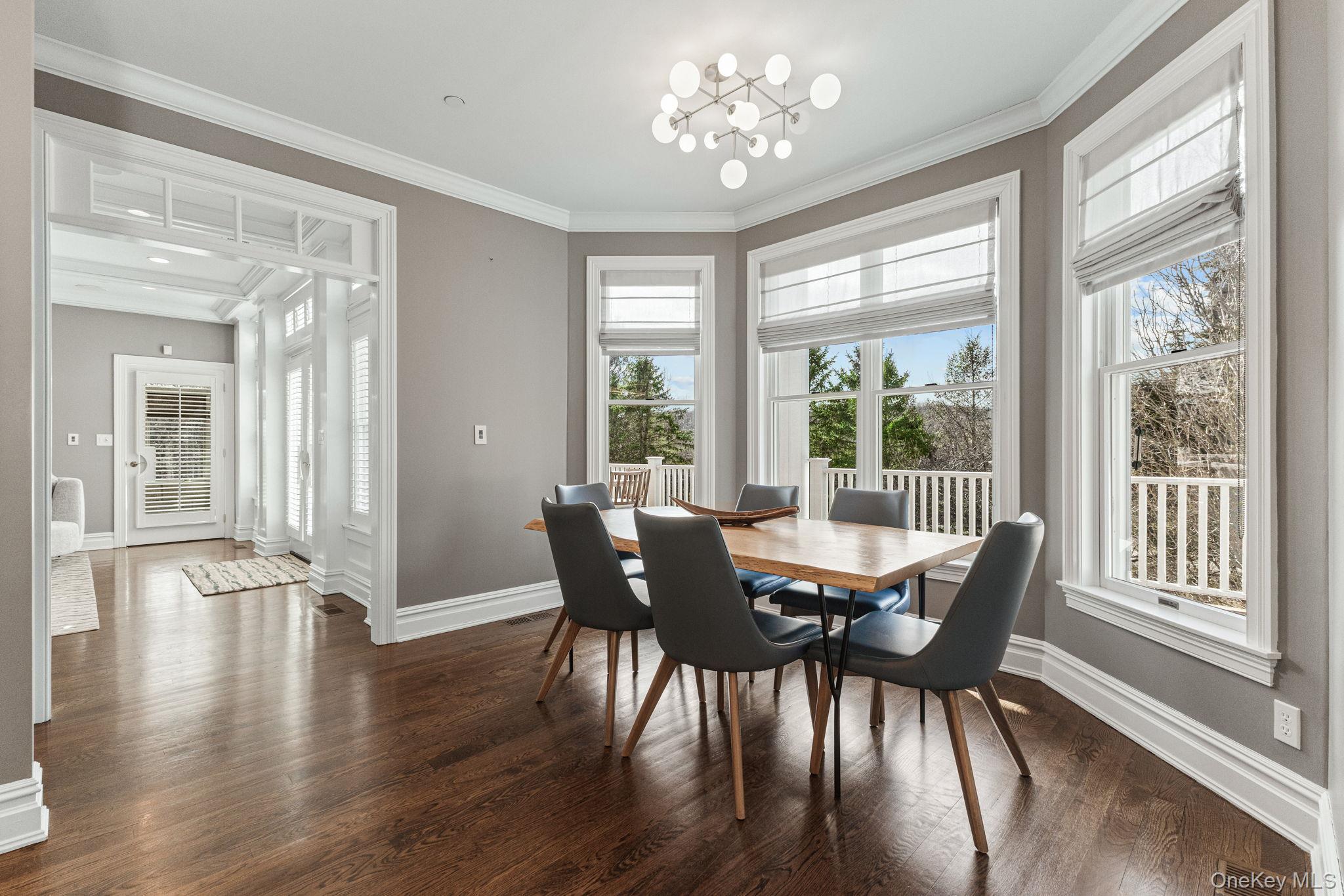 6 Oak Ridge Court West Harrison, NY 10604 - Photo 8 of 45 a view of a dining room with furniture window and wooden floor