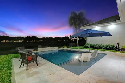 a view of a building with a yard