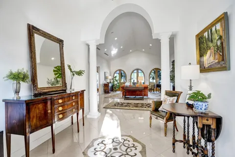 a bathroom with a sink double vanity and a mirror