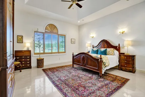 a view of a swimming pool with an outdoor seating