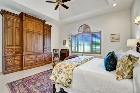 a living room with furniture and dining area