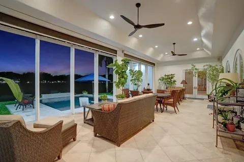 a view of a lake with a house in the background