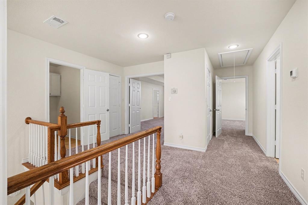 208 Cobblestone Circle Red Oak, TX 75154 - Photo 20 of 38 a view of hallway with stairs