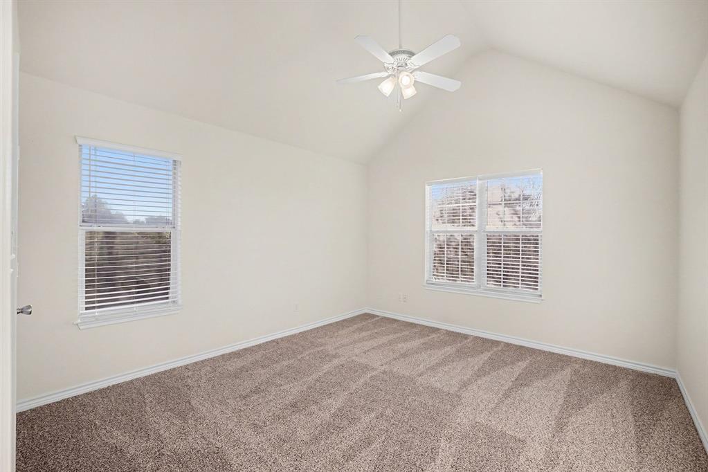 208 Cobblestone Circle Red Oak, TX 75154 - Photo 23 of 38 a view of an empty room with a window